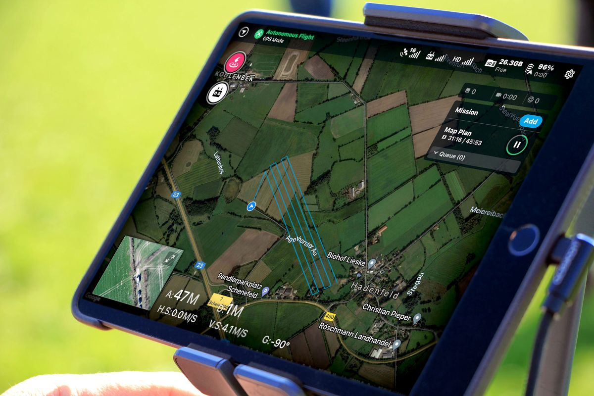 Tablet shows drone flight planning for creating a 3D terrain model for PV system planning.
